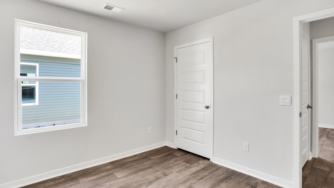 Spacious, unfurnished interior of a new home in Lockwood Landing, Supply (Image 18).