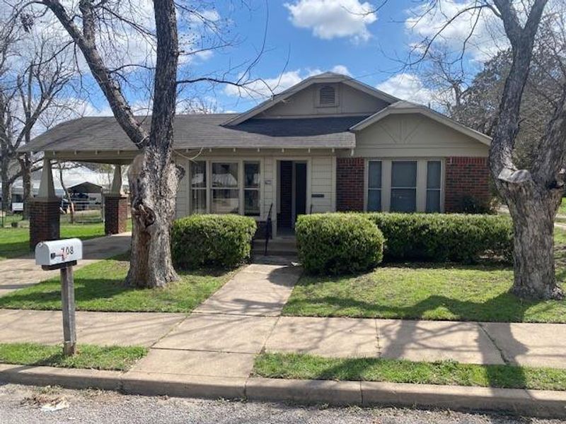 Front exterior of a new home in , Brownwood, TX, highlighting curb appeal (Image 1). Front exterior of a new home in , Brownwood, TX, highlighting curb appeal (Image 1).