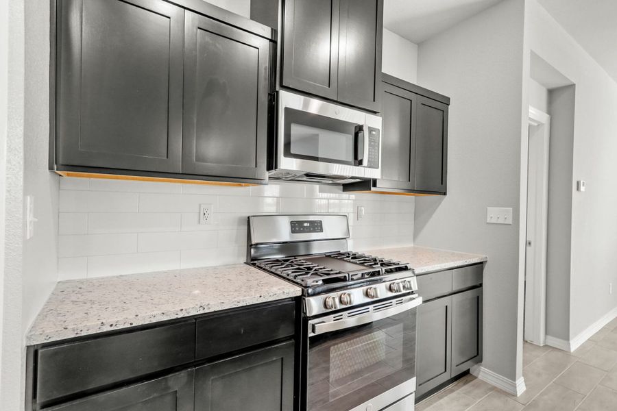 Furnished interior view inside a new home in Paseos Del Este, Horizon City (Image 5).