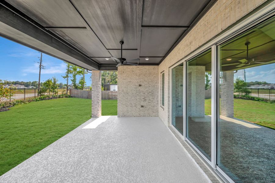 Exterior details and patio area of a home in ARTAVIA - Parkview Collection, Conroe (Image 4).