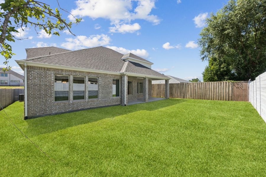 Exterior details and patio area of a home in Painted Tree Lakeside, McKinney (Image 23).