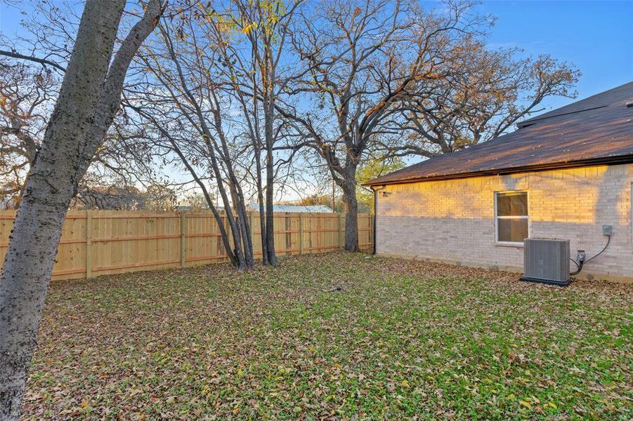 View of yard with central AC