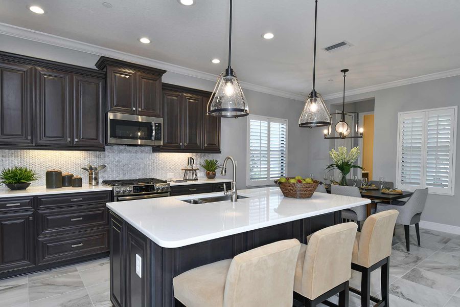 Furnished interior view inside a new home in Boca Royale Golf & Country Club at Wellen Park, Englewood (Image 11).