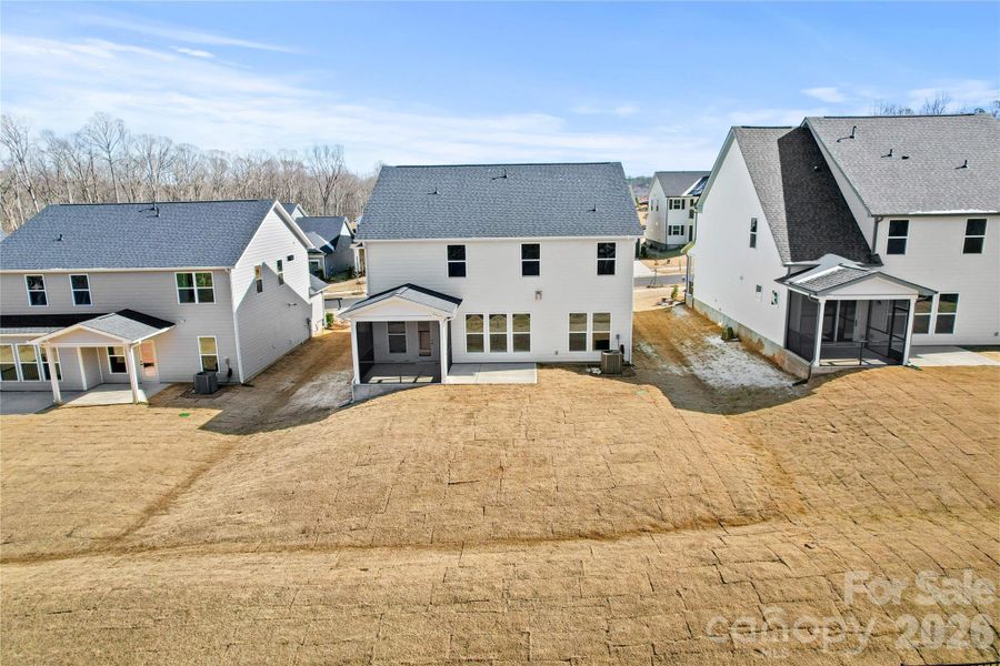 Exterior details and patio area of a home in Forest Creek, Waxhaw (Image 29).