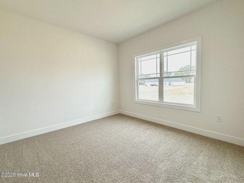 Spacious, unfurnished interior of a new home in Wood Creek Landing, Leland (Image 21). Spacious, unfurnished interior of a new home in Wood Creek Landing, Leland (Image 21).