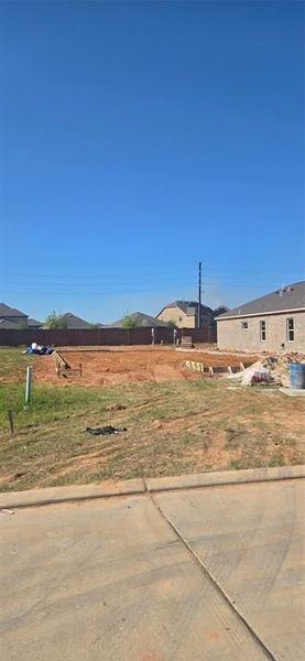 Front exterior of a new home in Sunterra, Katy, TX, highlighting curb appeal (Image 56). Front exterior of a new home in Sunterra, Katy, TX, highlighting curb appeal (Image 56).