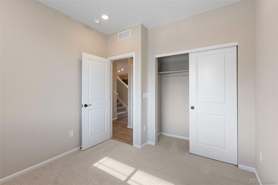 Spacious, unfurnished interior of a new home in The Cottages Collection at Ridgeline Vista, Brighton (Image 18).