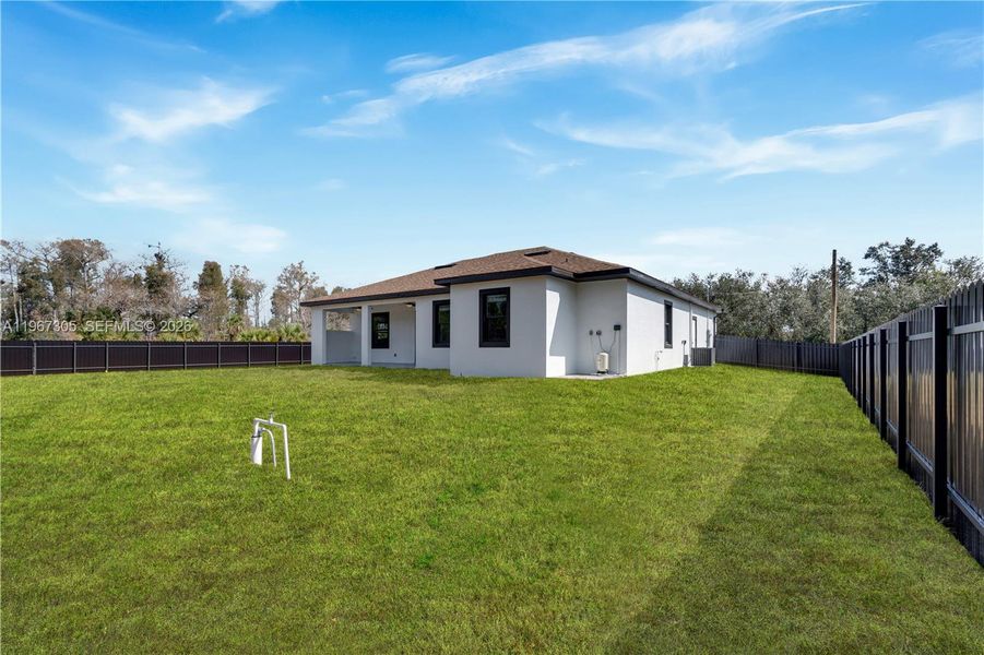 Exterior details and patio area of a home in , Lehigh Acres (Image 3).