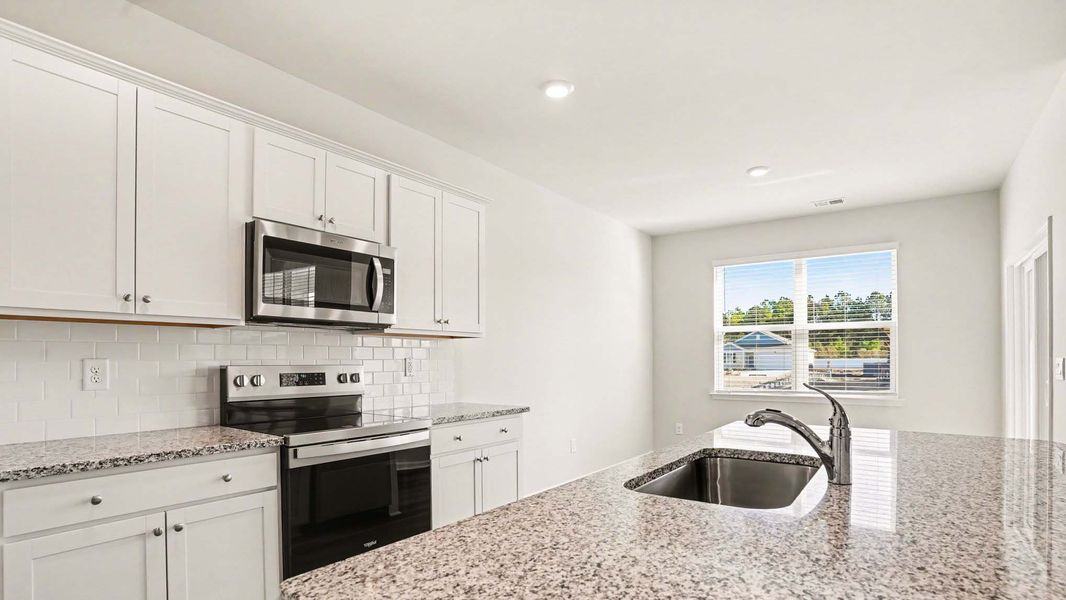 Representative furnished interior of a home built from the Alston by D.R. Horton in Preserve at Cypress Commons, Conway (Image 6).