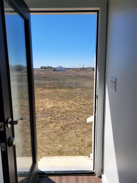 Step out to an expansive yard offering vast open space and a peaceful rural setting. Step out to an expansive yard offering vast open space and a peaceful rural setting.