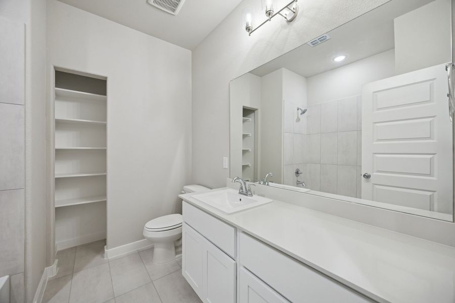 Bathroom in the Stanley II home plan by Trophy Signature Homes – REPRESENTATIVE PHOTO Bathroom in the Stanley II home plan by Trophy Signature Homes – REPRESENTATIVE PHOTO