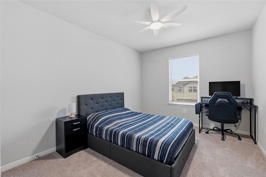 Furnished interior view inside a new home in Crosswinds, Kyle (Image 29).