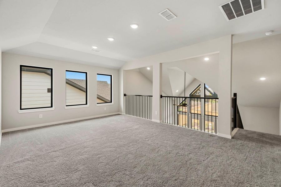 A perfect place for entertaining, this gameroom has room for a pool table. Balcony railing overlooks the downstairs making the home feel wide-open! A perfect place for entertaining, this gameroom has room for a pool table. Balcony railing overlooks the downstairs making the home feel wide-open!