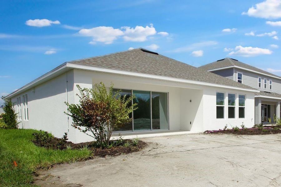 Exterior details and patio area of a home in Firethorn, Parrish (Image 2).