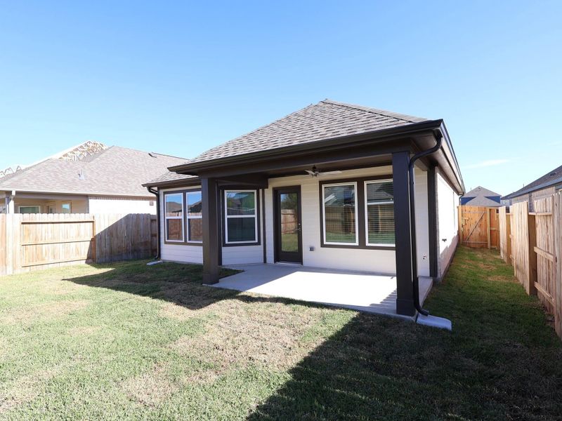 Exterior details and patio area of a home in Marvida, Cypress (Image 3).