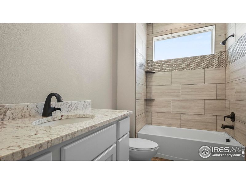 Shared Bathroom on Main Level Shared Bathroom on Main Level