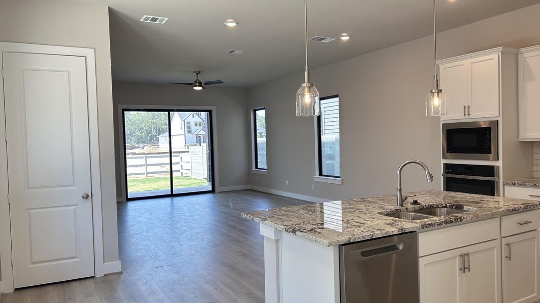 Furnished interior view inside a new home in Two Step Farm - Symphony Collection, Montgomery (Image 9).