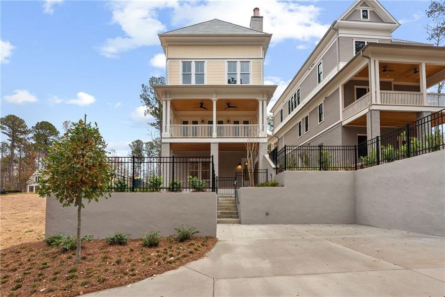 Front exterior of a new home in , Chattahoochee Hills, GA, highlighting curb appeal (Image 1).