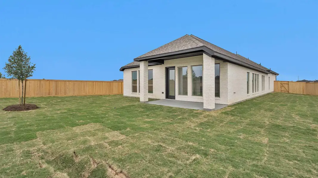 Exterior details and patio area of a home in Bridgeland, Cypress (Image 4).