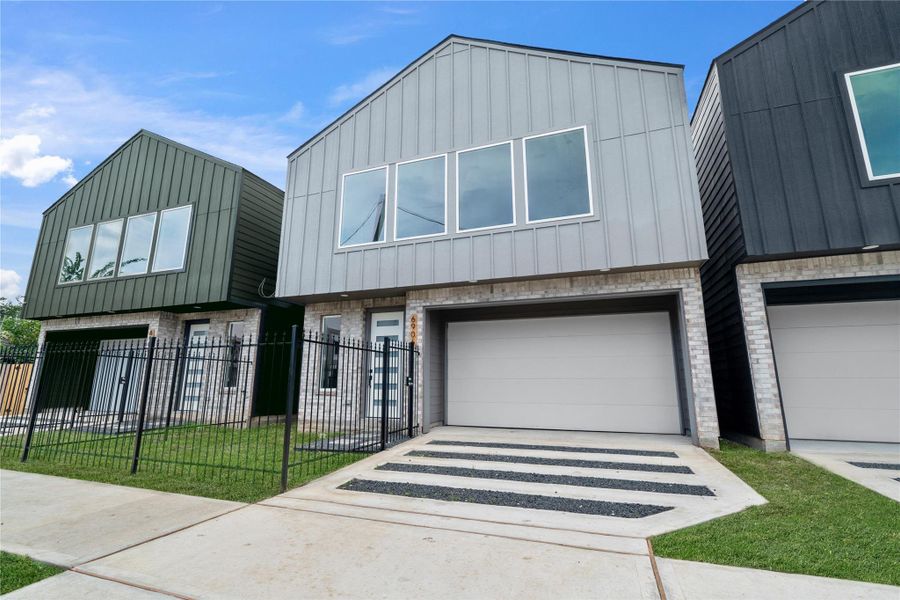 Gated entry, ribbon driveway, and a boutique-inspired design come together for an elevated welcome home experience. Gated entry, ribbon driveway, and a boutique-inspired design come together for an elevated welcome home experience.