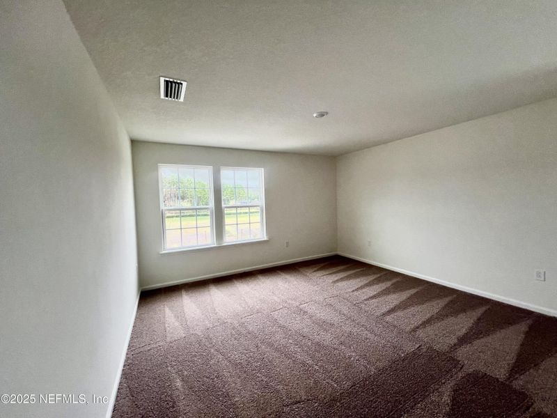 Spacious, unfurnished interior of a new home in Anabelle Island - Executive Series, Green Cove Springs (Image 12).