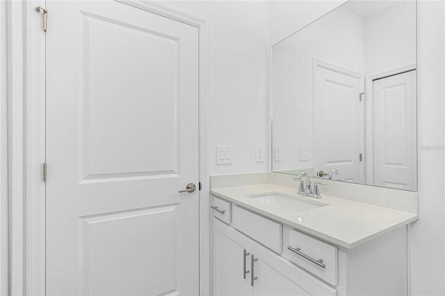 Furnished interior view inside a new home in Island Lakes at Coco Bay: Villas, Englewood (Image 16).