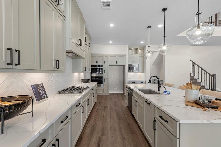 Furnished interior view inside a new home in Bridgeland, Cypress (Image 6).