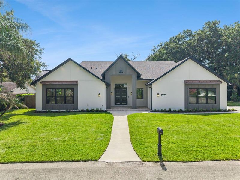Front exterior of a new home in , Altamonte Springs, FL, highlighting curb appeal (Image 2). Front exterior of a new home in , Altamonte Springs, FL, highlighting curb appeal (Image 2).