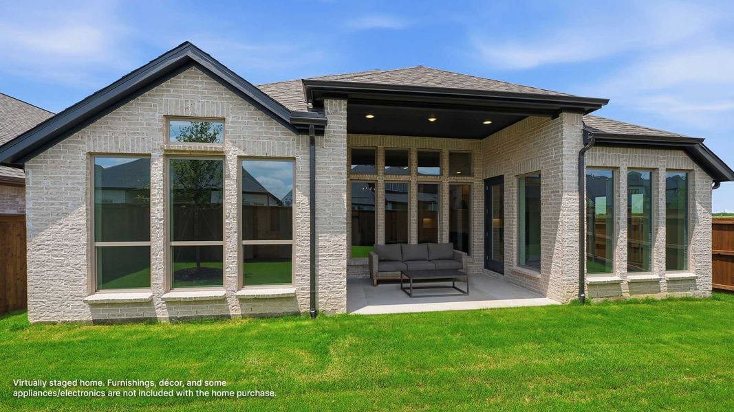 Exterior details and patio area of a home in Cambridge Crossing, Celina (Image 3). Exterior details and patio area of a home in Cambridge Crossing, Celina (Image 3).