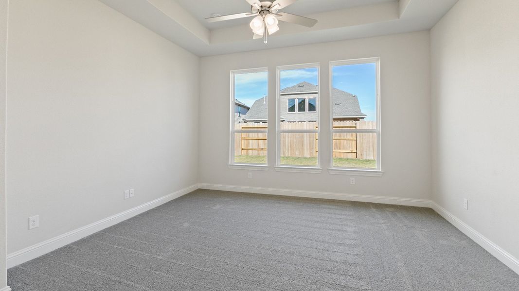 Representative furnished interior of a home built from the Yale by DRB Homes in Creekhaven, Iowa Colony (Image 11).