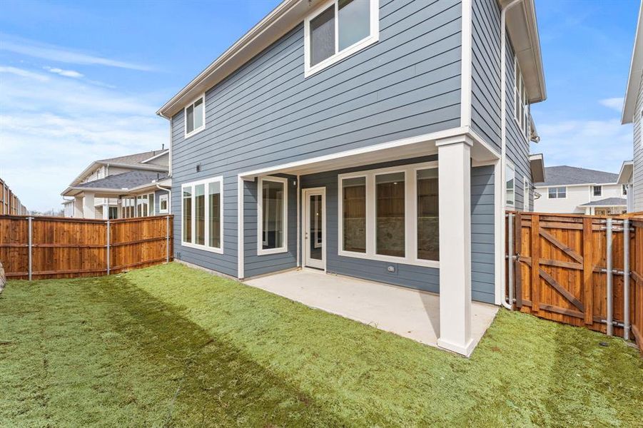 Exterior details and patio area of a home in North Square at Uptown, Celina (Image 2).