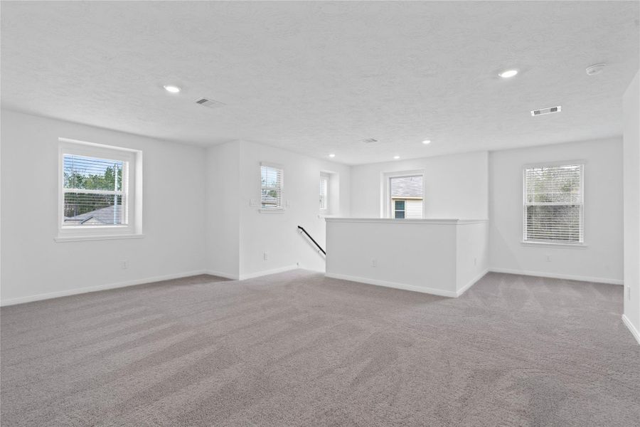 Come upstairs to the second floor with a game room, primary suite, secondary bedrooms and bathrooms. Come upstairs to the second floor with a game room, primary suite, secondary bedrooms and bathrooms.