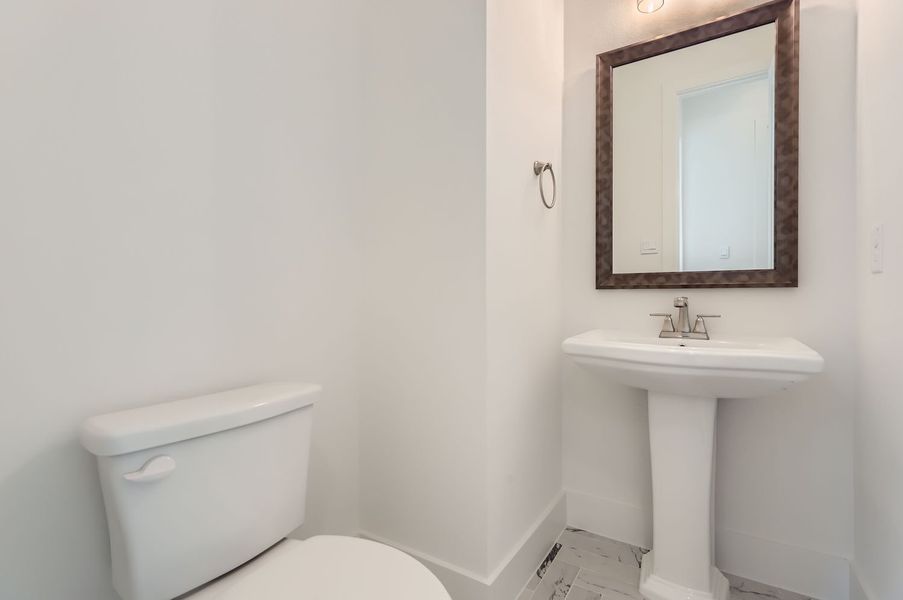 Plan 609 Powder Bath Representative Photo