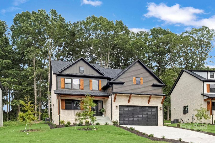 Front exterior of a new home in , Charlotte, NC, highlighting curb appeal (Image 24).