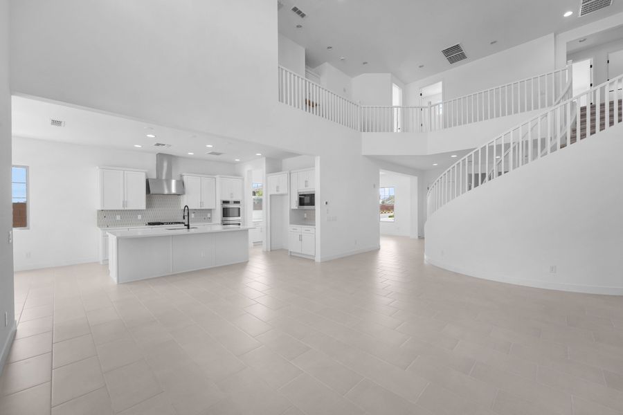 Spacious, unfurnished interior of a new home in Ellsworth Ranch, Queen Creek (Image 15).