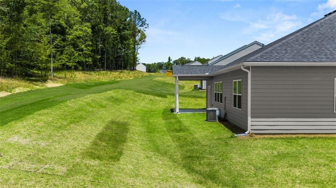 Exterior details and patio area of a home in Kingston Ranch at Lake Oconee, Buckhead (Image 3). Exterior details and patio area of a home in Kingston Ranch at Lake Oconee, Buckhead (Image 3).