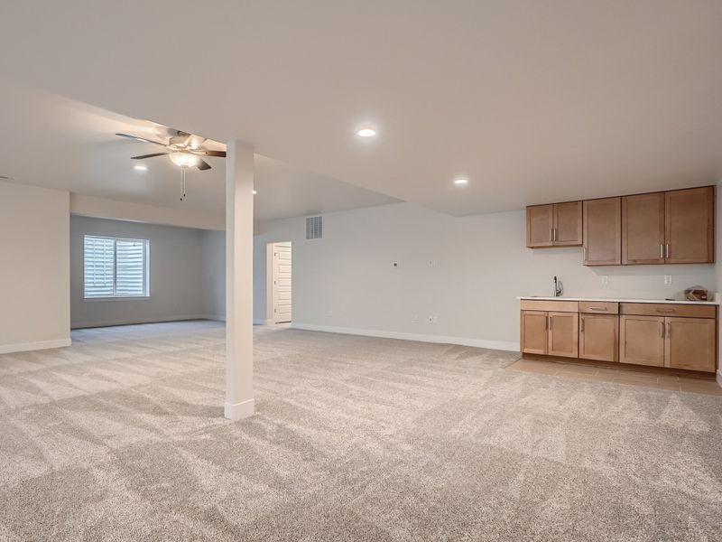 Plan C655 Finished Basement Representative Photo