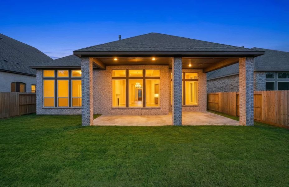 Exterior details and patio area of a home in The Highlands 55′, Porter (Image 26).