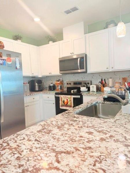 Furnished interior view inside a new home in , Winter Haven (Image 9).