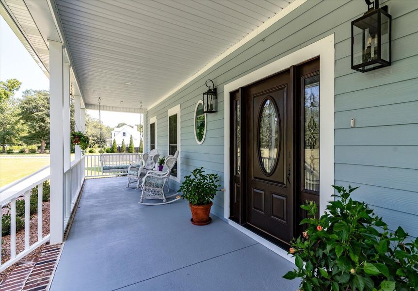 Exterior details and patio area of a home in , Ravenel (Image 28). Exterior details and patio area of a home in , Ravenel (Image 28).