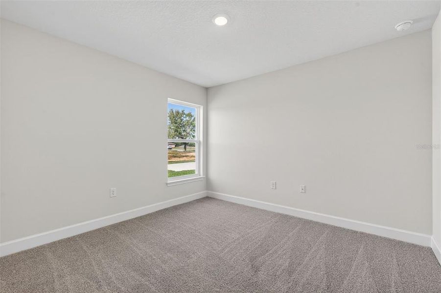 Spacious, unfurnished interior of a new home in Hill Country Estates, Dade City (Image 47).
