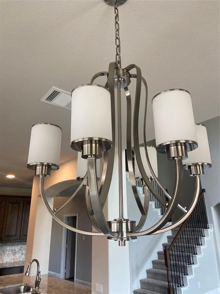 Close up of brushed nickel chandelier