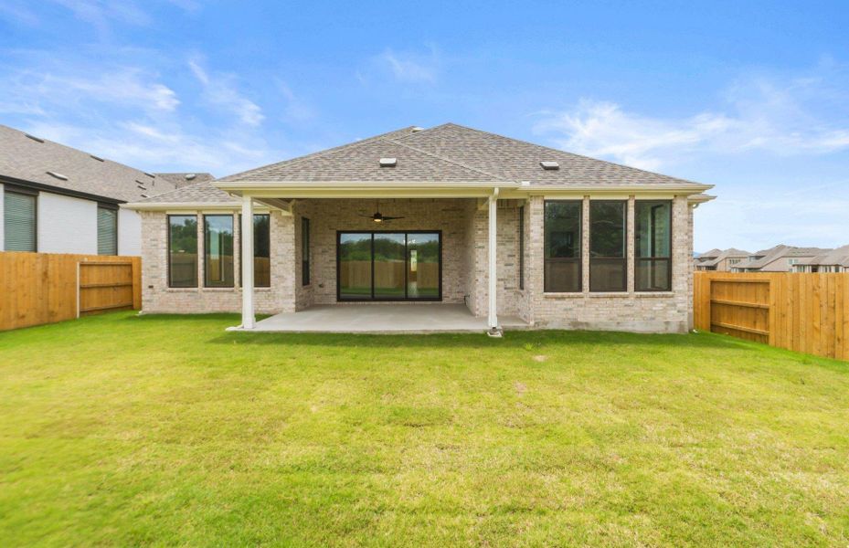 Exterior details and patio area of a home in 6 Creeks, Kyle (Image 19).