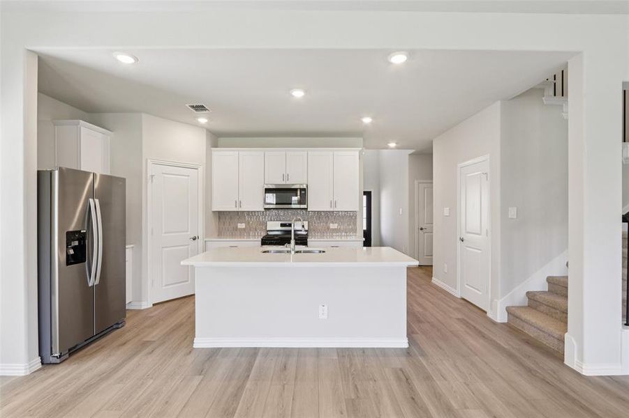 Furnished interior view inside a new home in Parks at Foster Crossing - Premier Series, Anna (Image 14). Furnished interior view inside a new home in Parks at Foster Crossing - Premier Series, Anna (Image 14).
