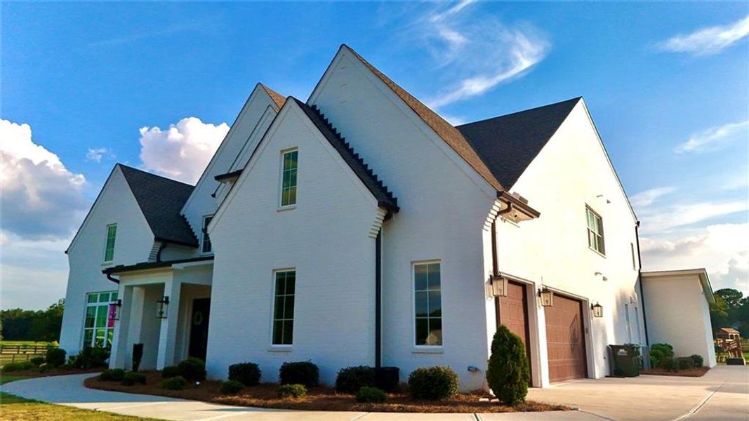 Front exterior of a new home in , Bishop, GA, highlighting curb appeal (Image 31). Front exterior of a new home in , Bishop, GA, highlighting curb appeal (Image 31).
