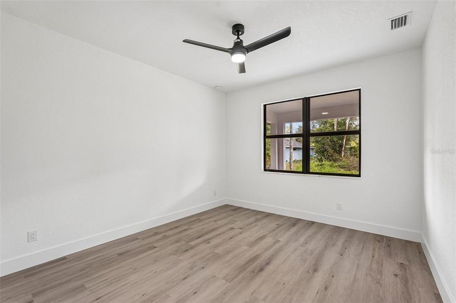 Spacious, unfurnished interior of a new home in , Port Charlotte (Image 24).