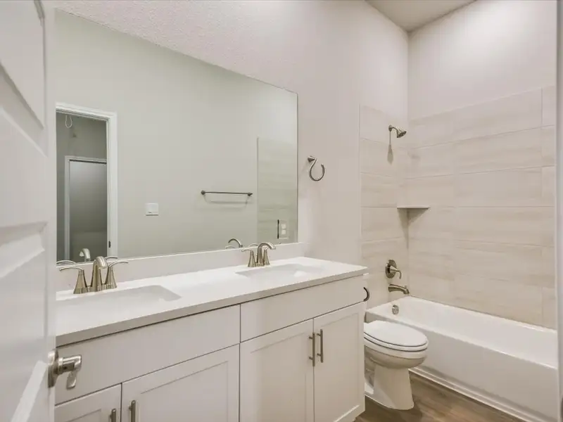 Furnished interior view inside a new home in Big Sky Ranch - Executive Collection, Dripping Springs (Image 4).