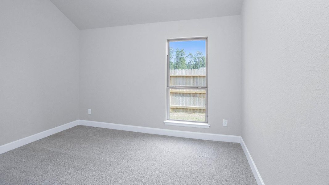 Spacious, unfurnished interior of a new home in Evergreen 70', Conroe (Image 11).