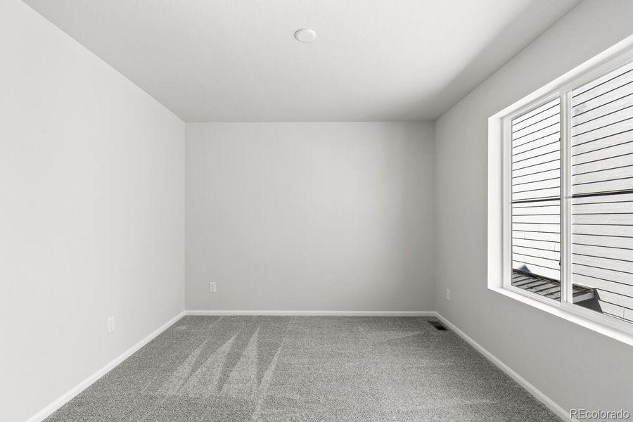 Spacious, unfurnished interior of a new home in The Villas Collection at Sterling Ranch, Littleton (Image 19).