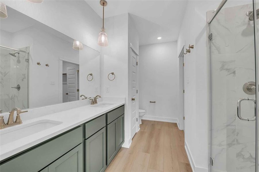 Please Note: These interior photos are not of the actual home but are of a completed one with a similar floor plan. Finishes, features, and layouts may vary.